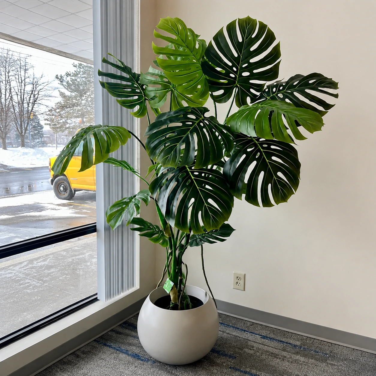 Realistic artificial Monstera plant designed for modern indoor spaces, adding natural tropical greenery to offices, homes, hotels, and commercial interiors.